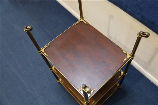 A pair of early 20th century tubular brass and walnut three tier etageres, W.1ft 3in. D.1ft 1in. H.2ft 4in.